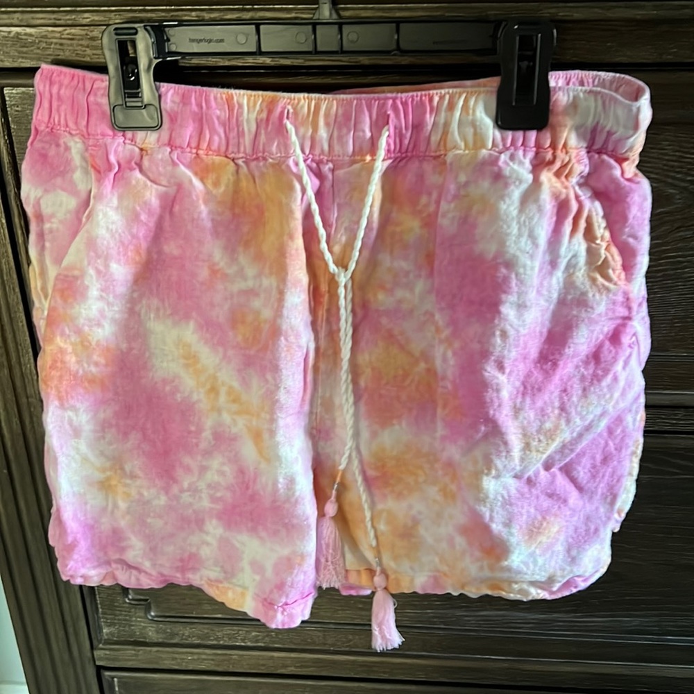 Hit pink and sherbet tie the elastic waist shorts